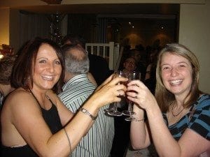 Party goers with Kir Royales - Christmas at the Angel Hotel