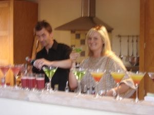 Party host with a cocktail shaker boy - summer cocktails at your home
