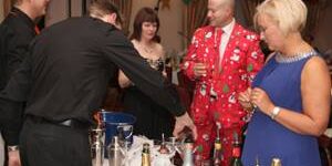 Party guests – understated Xmas office party cocktails